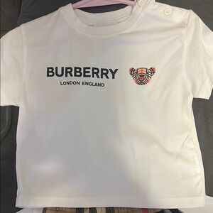 Burberry White Short Sleeve Tee with Logo & Burberry Plaid Skirt SOLD AS A SET